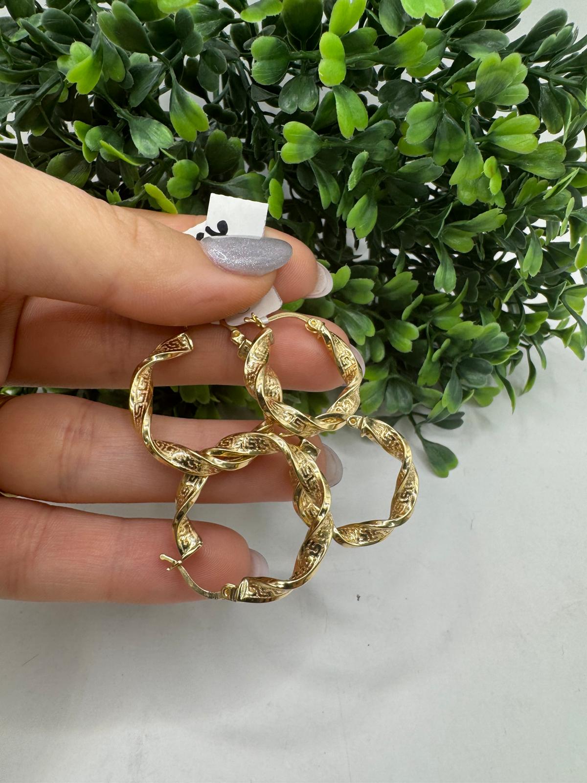 Dúo de argollas versas.