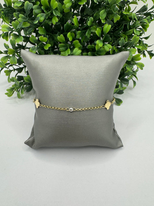 Pulsera rolo y clover dorados.