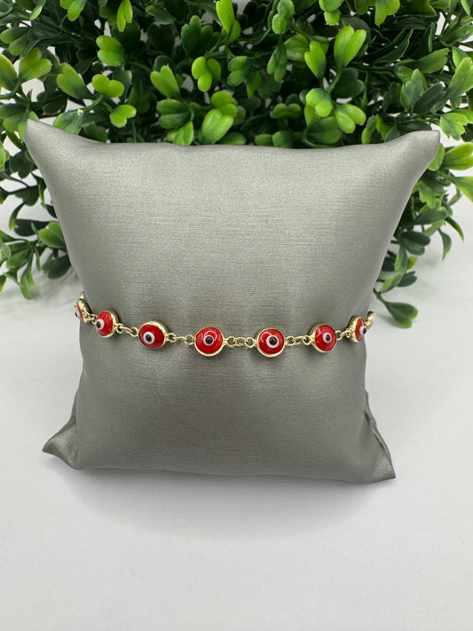 Pulsera de ojitos rojos.
